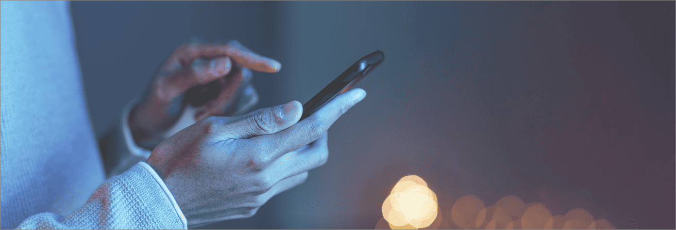 side-view-man-using-smartphone